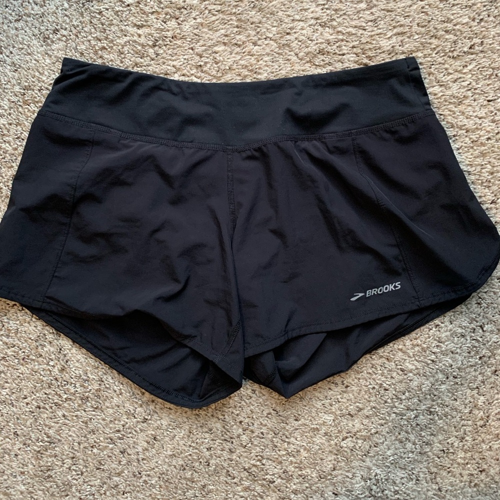 Brooks black size L running shorts.